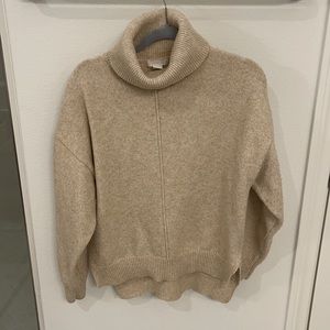 Cream colored turtle neck